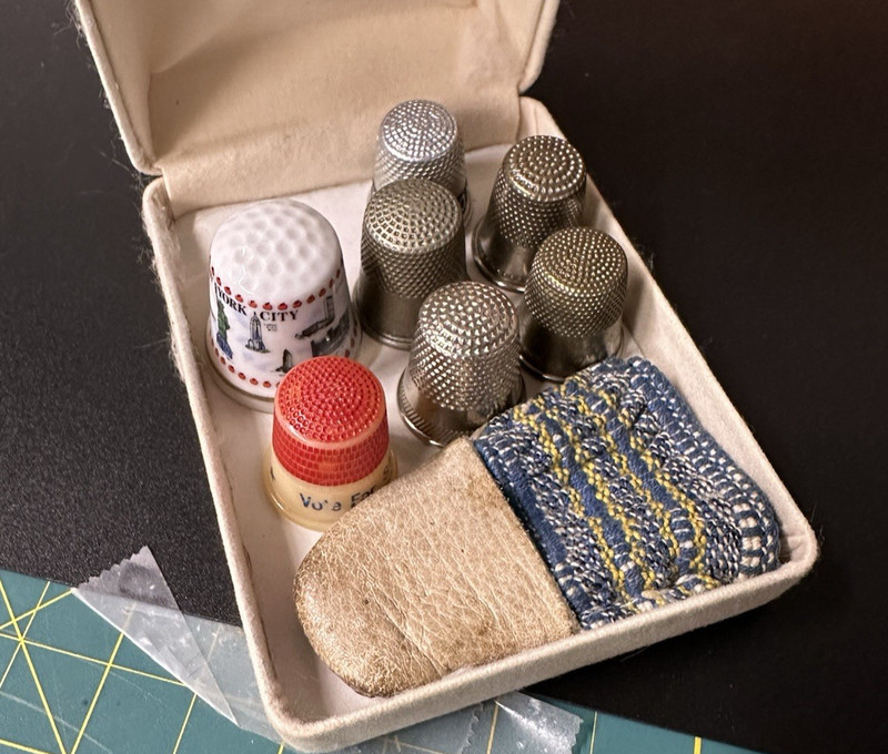 8 Vintage Sewing Thimbles  Leather, 1 porcelain, 6 metal Metal  (M9