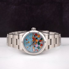 Rolex Oyster Perpetual 31mm Stainless Steel Watch Celebration Blue Dial 67480 2