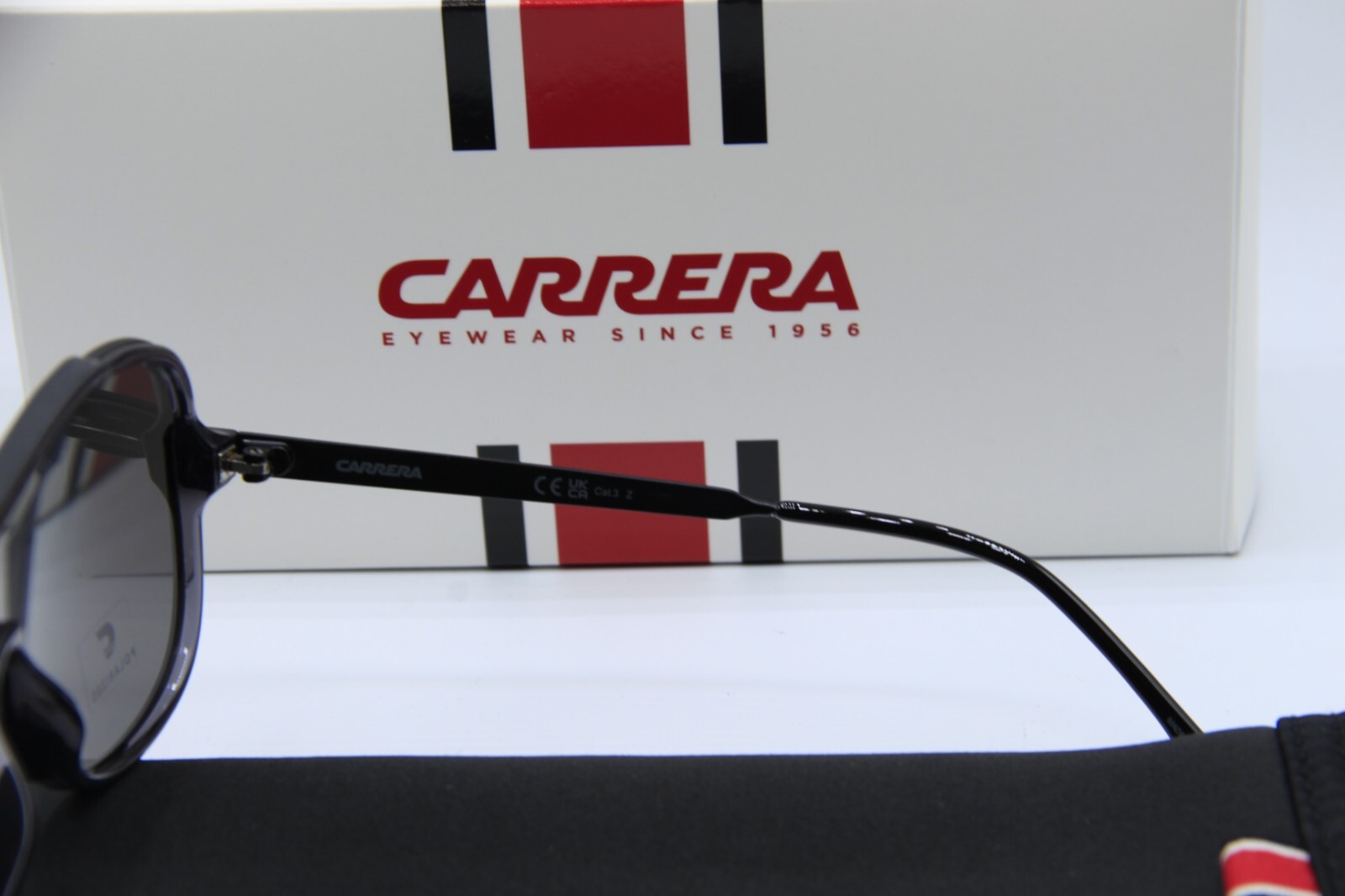 Carrera 1059/S Men's Sunglasses - Black Frame, Red/Grey Shaded Lenses, Size 64/11/145, 2-Year Warranty