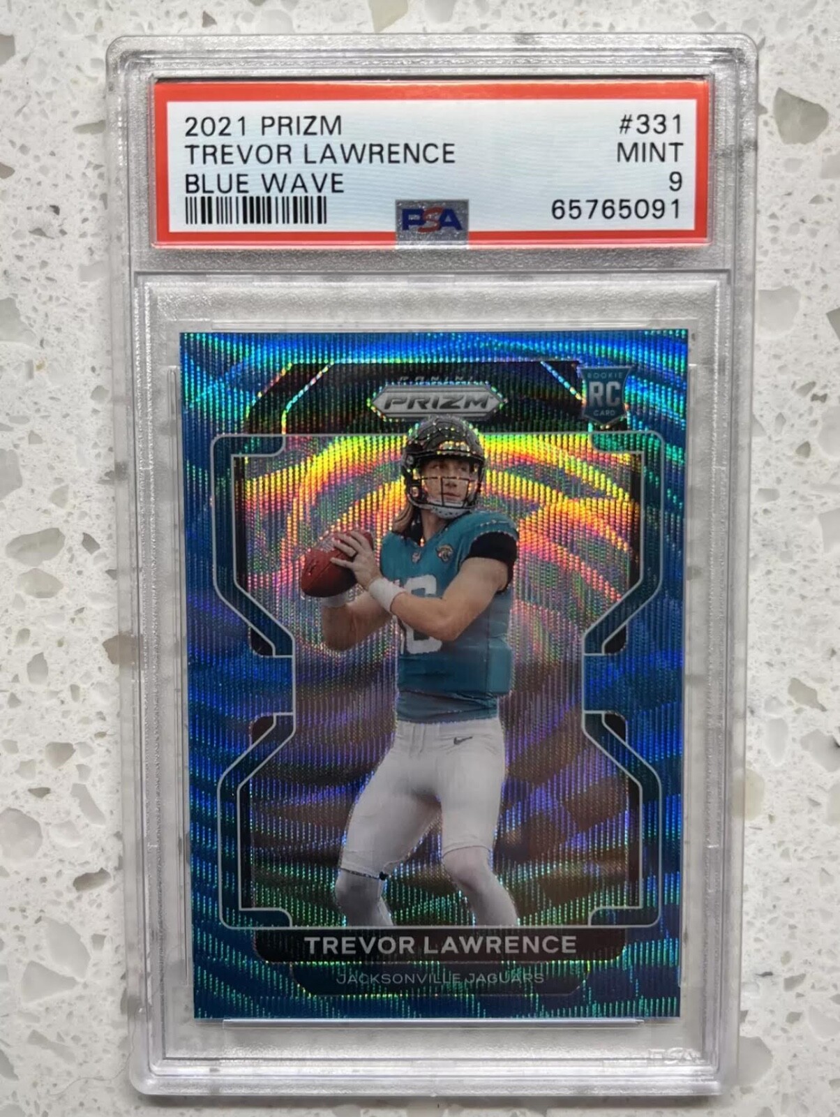 2021 Prizm Football Trevor Lawrence Blue Wave Prizm RC /199 Jaguars PSA 9 Mint