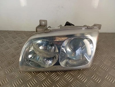 Optique avant principal gauche (feux)(phare) HYUNDAI TRAJET 921033A020 D4EA - Photo 1/4