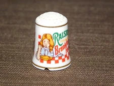 VINTAGE 1" HIGH PORCELAIN THIMBLE 1980 RALSTON PURINA CEREALS BREAKFAST FOOD