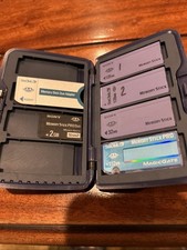 Lot of 4 SONY Sandisc Memory Stick with carrying case Plus 1 Dou Adapter W/ Card