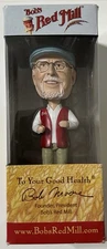 Bob's Red Mill Bob Moore Greatest Wealth is Health Bobblehead Doll Figure New