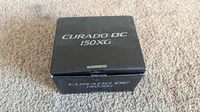 Shimano Curado DC 150XG Right Handed Bass Fishing Reel with Box