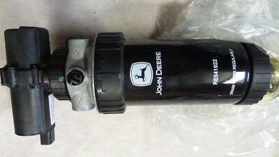 Unused John Deere RE541921 12V pump & filter combo.