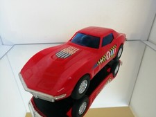 CHEVROLET CORVETTE PLASTIC IN RED 1 WITH FRICTION RARE