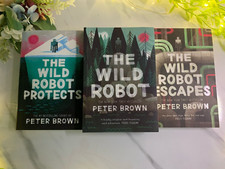 The Wild Robot Series: The Wild Robot Protects Escapes by Peter Brown Paperback