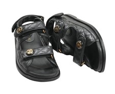 Chanel Dad Sandals With Gold Logo Details in Black