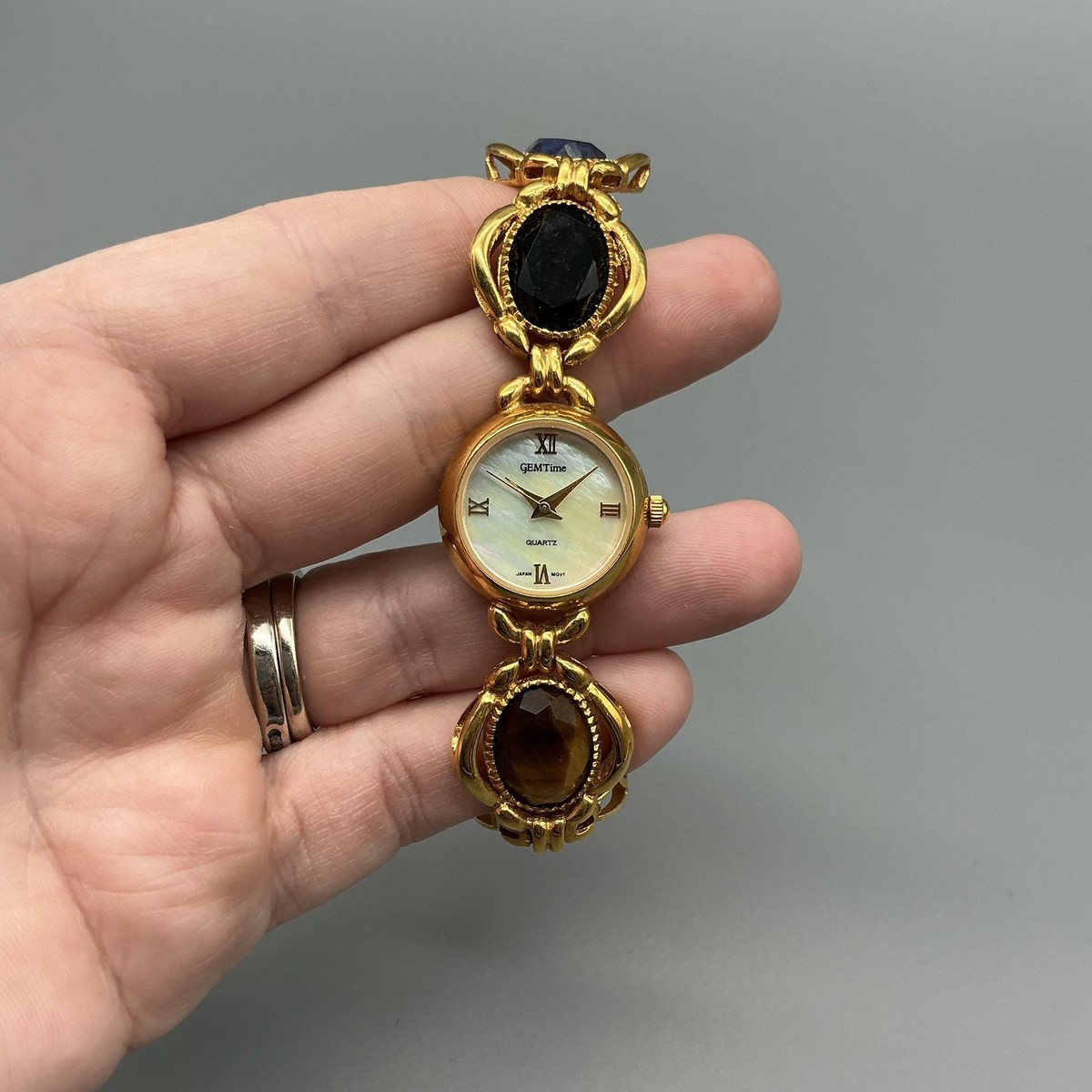 GEMTime Womens Watch 19mm MOP Gold Tone Multicolor Stone New  display picture 2
