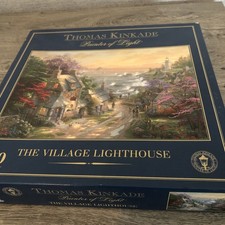 thomas kinkade jigsaw puzzles 1000 pieces . The Village Lighthouse