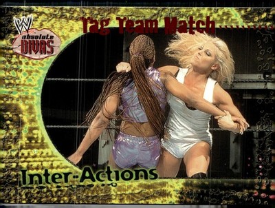 2002 Fleer WWE #14 IA Tag Team Match Ivory and Jackie v. Trish and Linda Miles