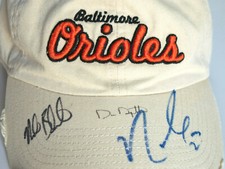 Nelson Cruz Mike Bordick Dan Duquette Autograph Signed Orioles Hat 2014 ALDS GM3