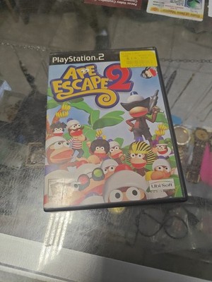 APE ESCAPE 2 (Playstation 2) Ubi Soft Entertainment, w/ book, ESRB - E