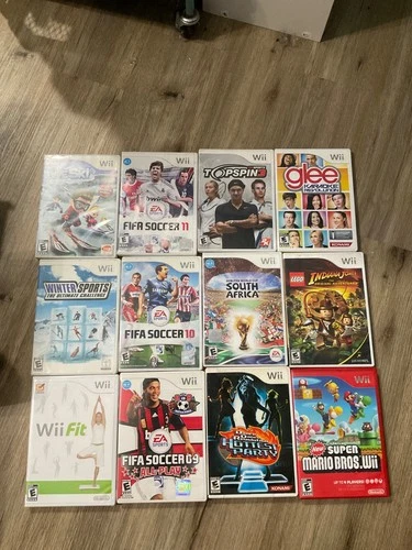 Nintendo Wii games. Lot of 12. FIFA, dance, glee, sports, new super Mario bros