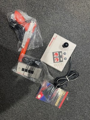 NES ADVANTAGE, FOUR SCORE, ZAPPER, NINTENDO AND NES CLEANING KIT