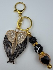 Hand made beaded key chain/Bag charm Bling. Wings . Gifts. Basket filler.