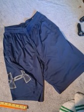 Męskie spodenki S Under Armour niebieskie luźne kieszenie