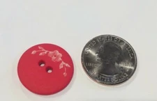 DILL BUTTONS #310699 RED WITH WHITE FLOWERS-- 2 HOLE--23MM-- 8 BUTTONS IN A SET