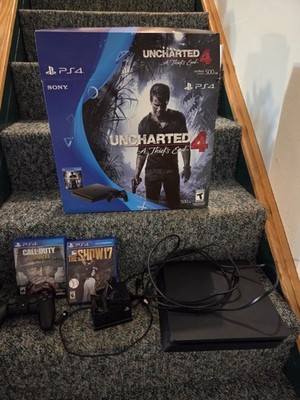 Sony PlayStation 4 500GB Gaming Console - 2 Games 1 Controller & Charging Stand