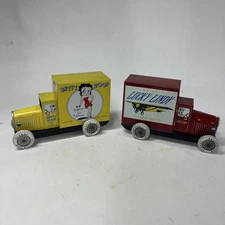 Pair Of Vintage Schylling Tin Toy Delivery Trucks Betty Boop Lucky Lindy