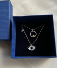 Image of Swarovski Set Of 2 Necklaces Gold Tone Evil Eye Symbolica & Creativity