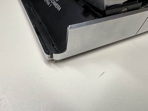 FOTOCAMERA TERRESTRE VINTAGE POLAROID SX-70 ALFA 1 PER RIPARAZIONE RICAMBI CREPA NON FUNZIONANTE - Foto 4 di 11