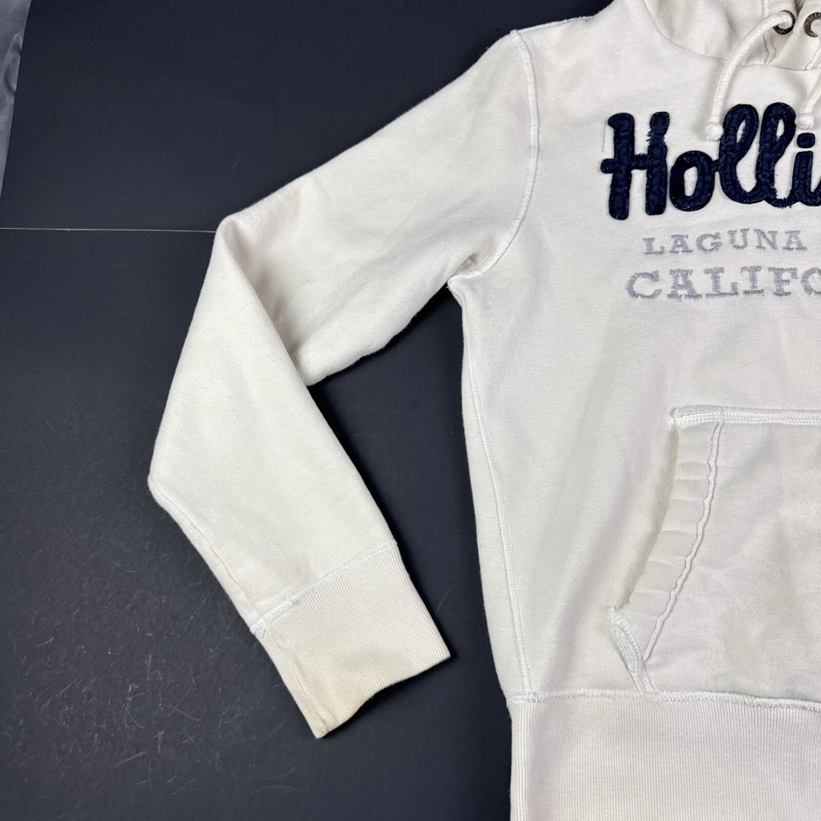 OFF WHITE Felpa con cappuccio HOLLISTER LAGUNA BEACH CALIFORNIA donna taglia XS bianco panna