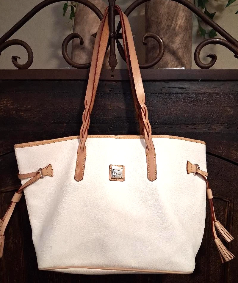 Dooney & Bourke Cream Leather Charleston Large Tote with tan leather handles