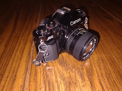 Canon A-1 35mm Film camera Black body New FD 50mm f1.4 Lens MADE