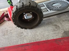 387660 TIRE ASSY FRONT DRIVE WHEEL   TENNANT 7300 & MORE