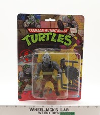 Rocksteady 10-Back Teenage Mutant Ninja Turtle TMNT 1988 Playmates NEW SEALED