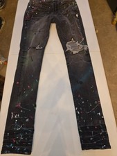 Pre-owned AMIRI paint splatter distressed jea...