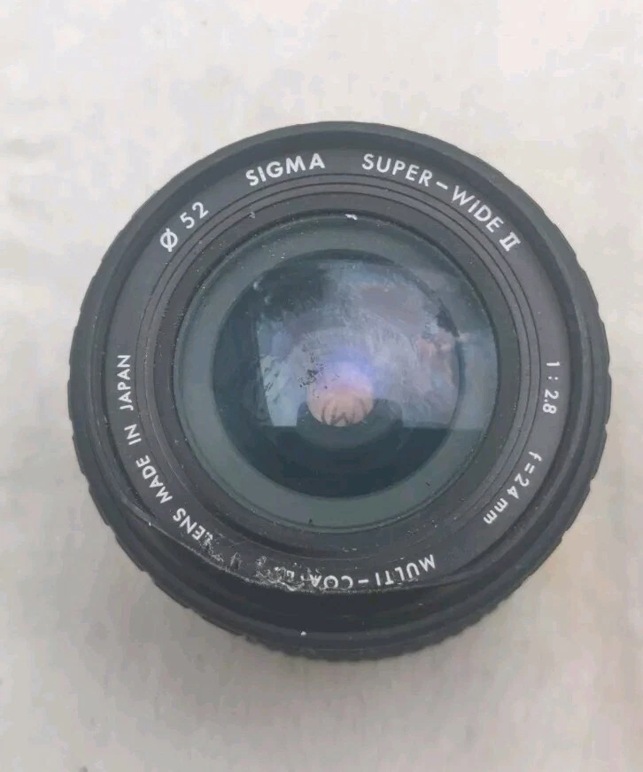 Grand Angle Sigma Super-Wide II 2.8 24mm pour Minolta. Bord légèrement déformé.  - Photo 2/4