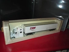 Trinty distribution serv semi tractor peterbilt 387  speccast Van Trailer 1:64 
