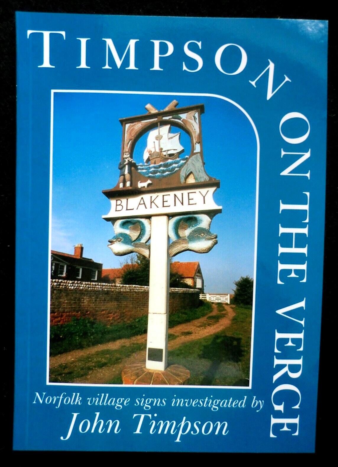 NEW; (John) Timpson on the Verge  (May 2000-1st) Norfolk Village Signs Illust PB