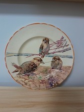 Antique kookaburra Plate” Tug of War.. Signed I.A.Crisp...