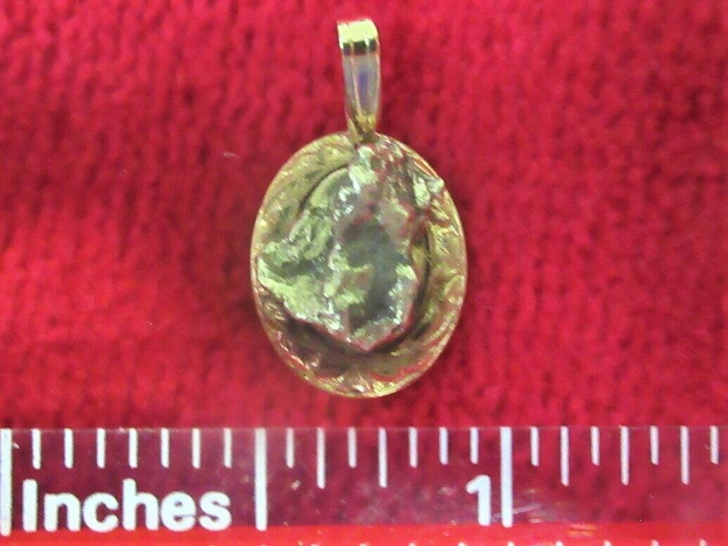 YUKON GOLD NUGGET MOUNTED ON A 14k Gold Pendant  TOTAL WEIGHT OF