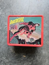 Surreal Entertainment Daredevil Lunchbox with Thermos. Top has dent