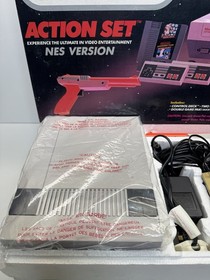 Nintendo NES Action Set Console Tested Working 2 controllers 1 gun