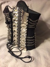 Hand tooled leather and metal corset, steampunk/medieval style.