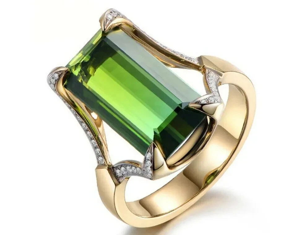 Anillo de compromiso de peridoto verde corte esmeralda genuino de 2 quilates enchapado en oro amarillo de 14 quilates Foto 2 de 4