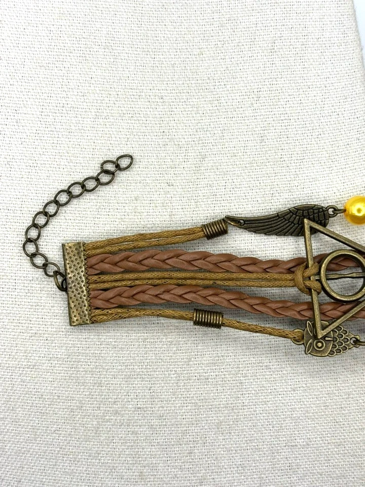 Pulsera Harry Potter Reliquias de la Muerte Búho Snitch Cinco Filas Cuero Marrón Dije Foto 2 de 4