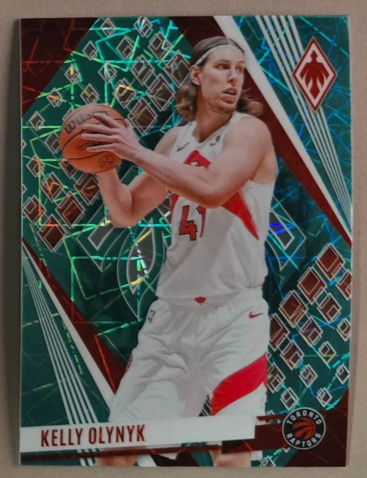 2023-24 Panini Phoenix #124 Kelly Olynyk Teal Lazer Toronto Raptors - Image 1 of 1