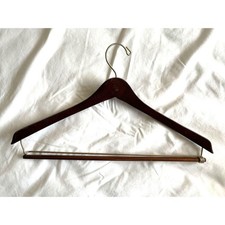 WOODEN SUIT HANGERS. 2 Types - Walnut and Natural. Locking drop bar SEE DESCR