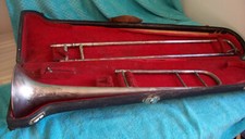 Vintage Silver Pan American Trombone for parts includes the old case 7 " bell