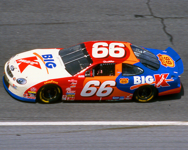 DARRELL WALTRIP 1999 #66 BIG KMART FORD DAYTONA 500 ON TRACK 8X10