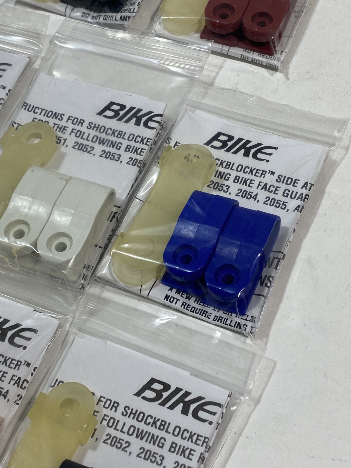 (8) SETS OF VINTAGE BIKE SHOCKBLOCKERS FOOTBALL HELMET FACEMASK CLIPS