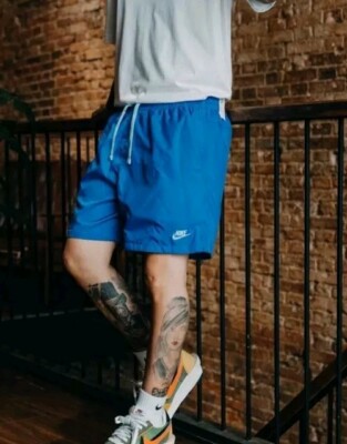 nike woven shorts light blue