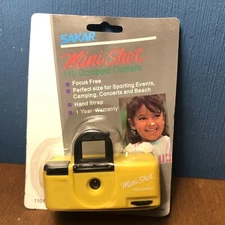 VINTAGE Sakar 110 Film Micro Mini Shot Travel Handheld Camera YELLOW - NEW NOS